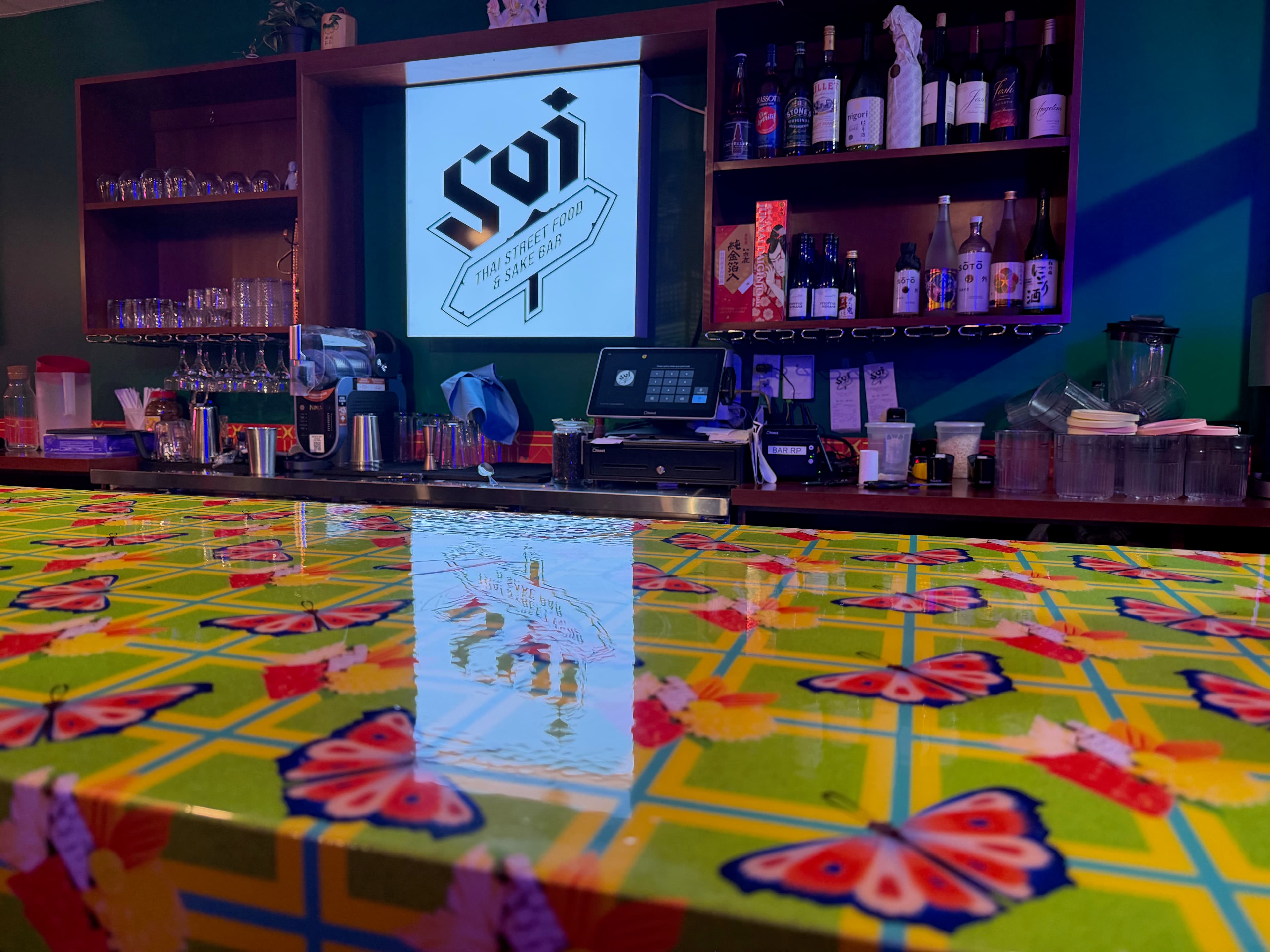 SOI neon sign and bar