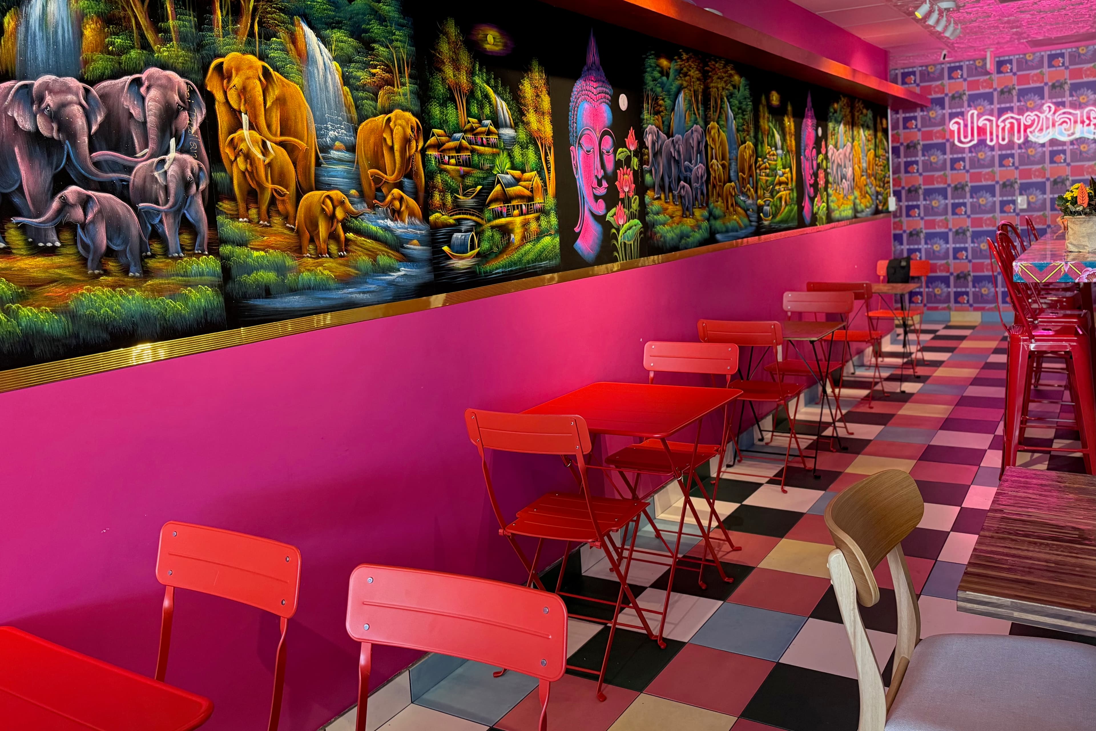 Red foldout chairs and colorful floor